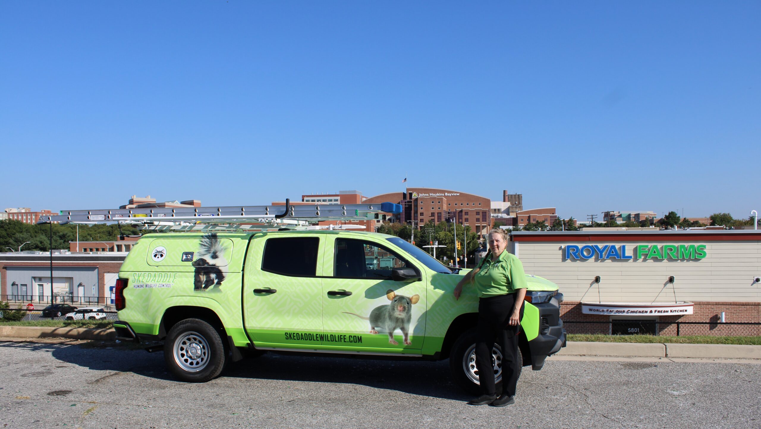 skedaddle truck and Carol at Royal Farms Baltimore Skedaddle Humane Wildlife Control August, 2024 (1)