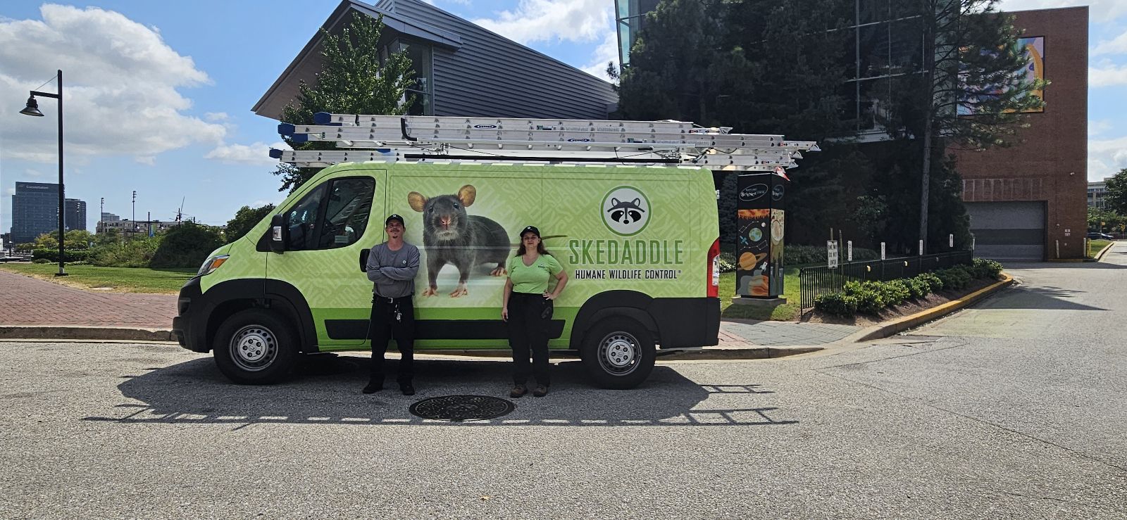 two Baltimore technicians and truck Baltimore Skedaddle Humane Wildlife Control September, 2024 (1)